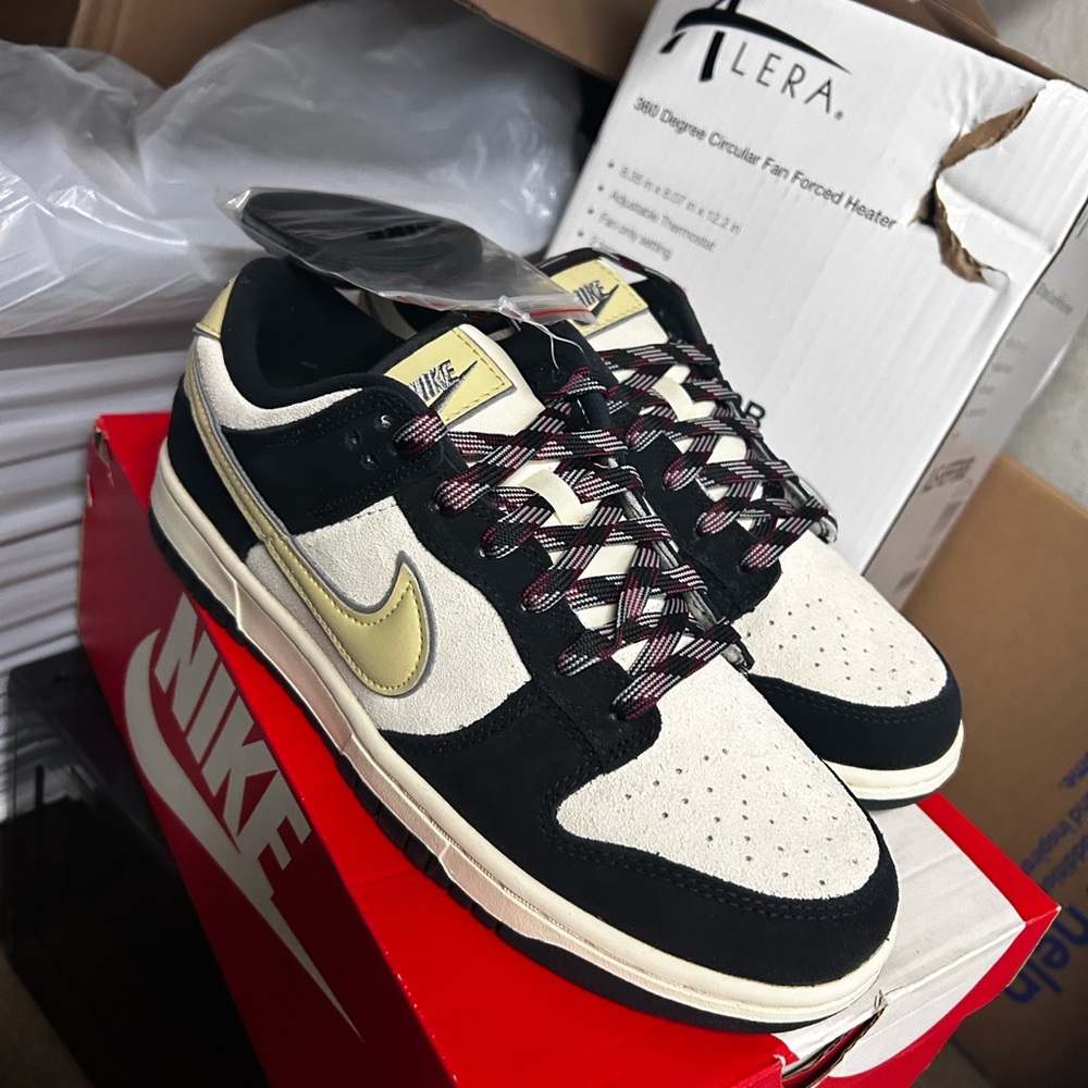 Nike Men's Black and White Sneakers with Gold Accents